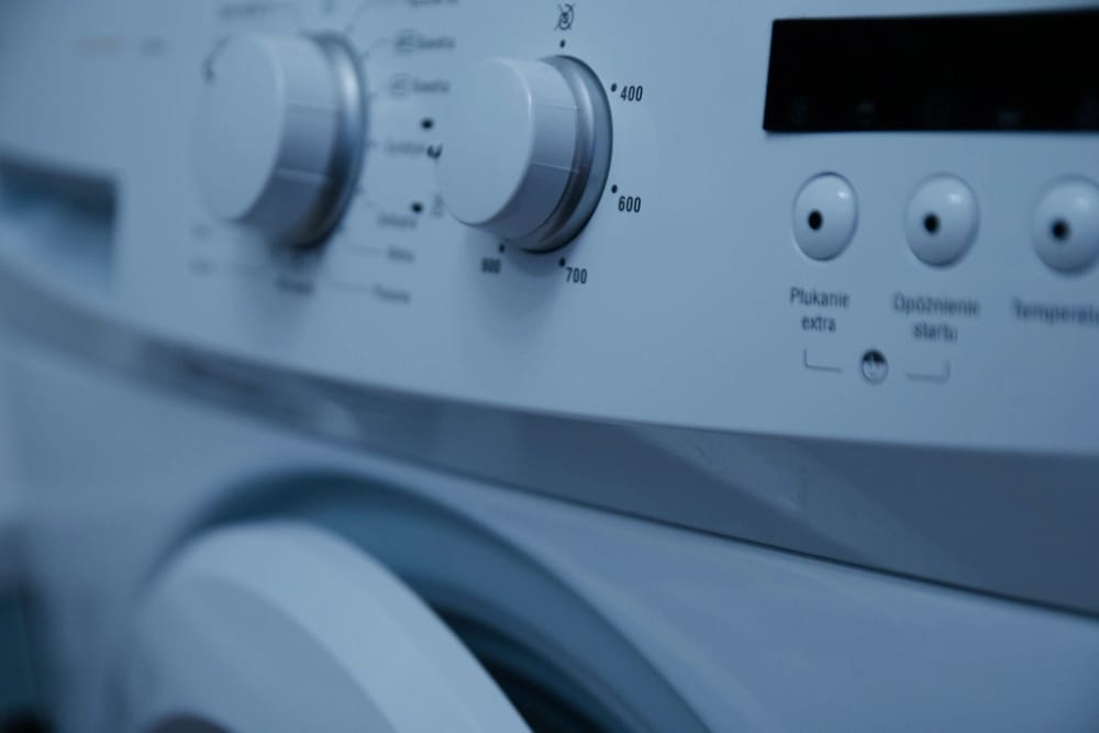A washing-machine control panel, the appliance industry page hero.