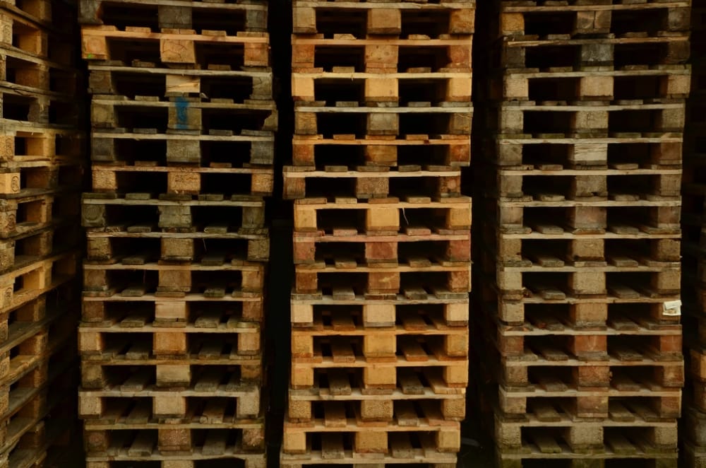 Stacked euro pallets, the consumer products industry page hero.